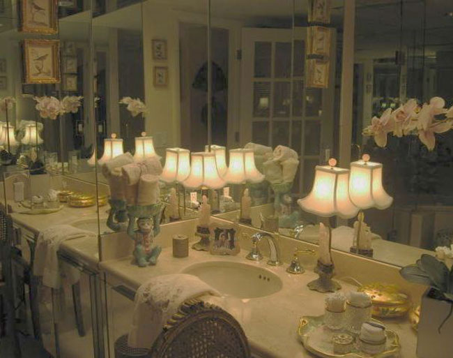 Simple Crema Marfil Marble, mirror faced cabinetry, and a pair of Rose Quartz Antique Figurine Lamps and.... VOILA!